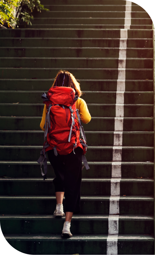 A person confidently stepping forward on a path, representing the first step toward mental wellness with Lavni’s supportive care.