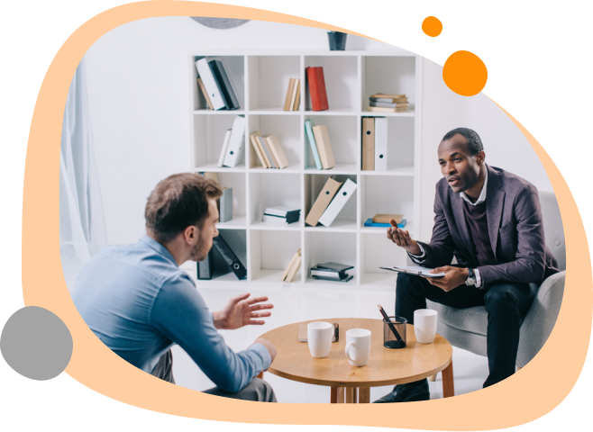 A Man talking with a therapist during a counseling session