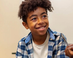 Happy child smiling in a comfortable learning environment